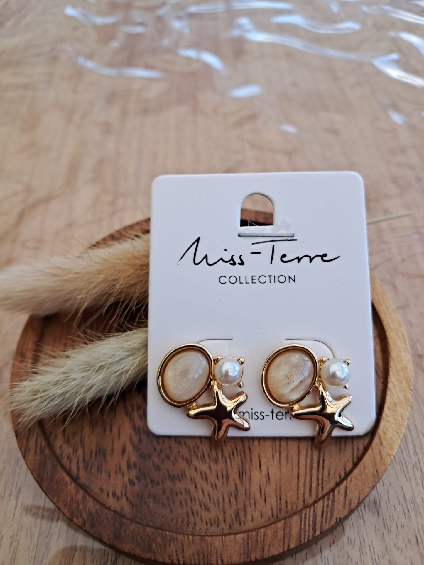 Oorbellen kleine zeester met parel NR 76