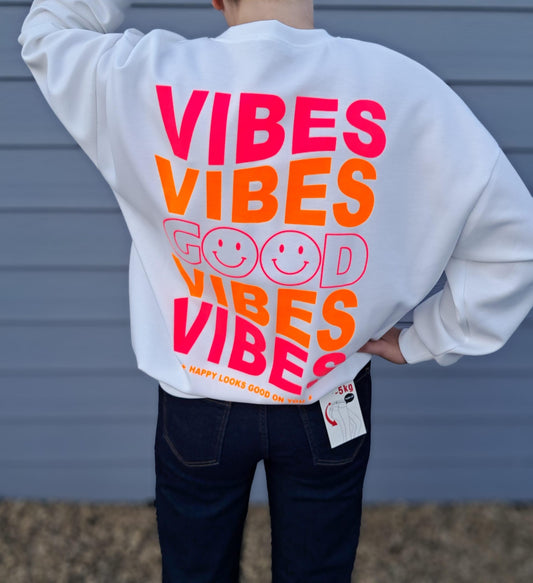 Sportieve, cosy pull met fluo opschrift