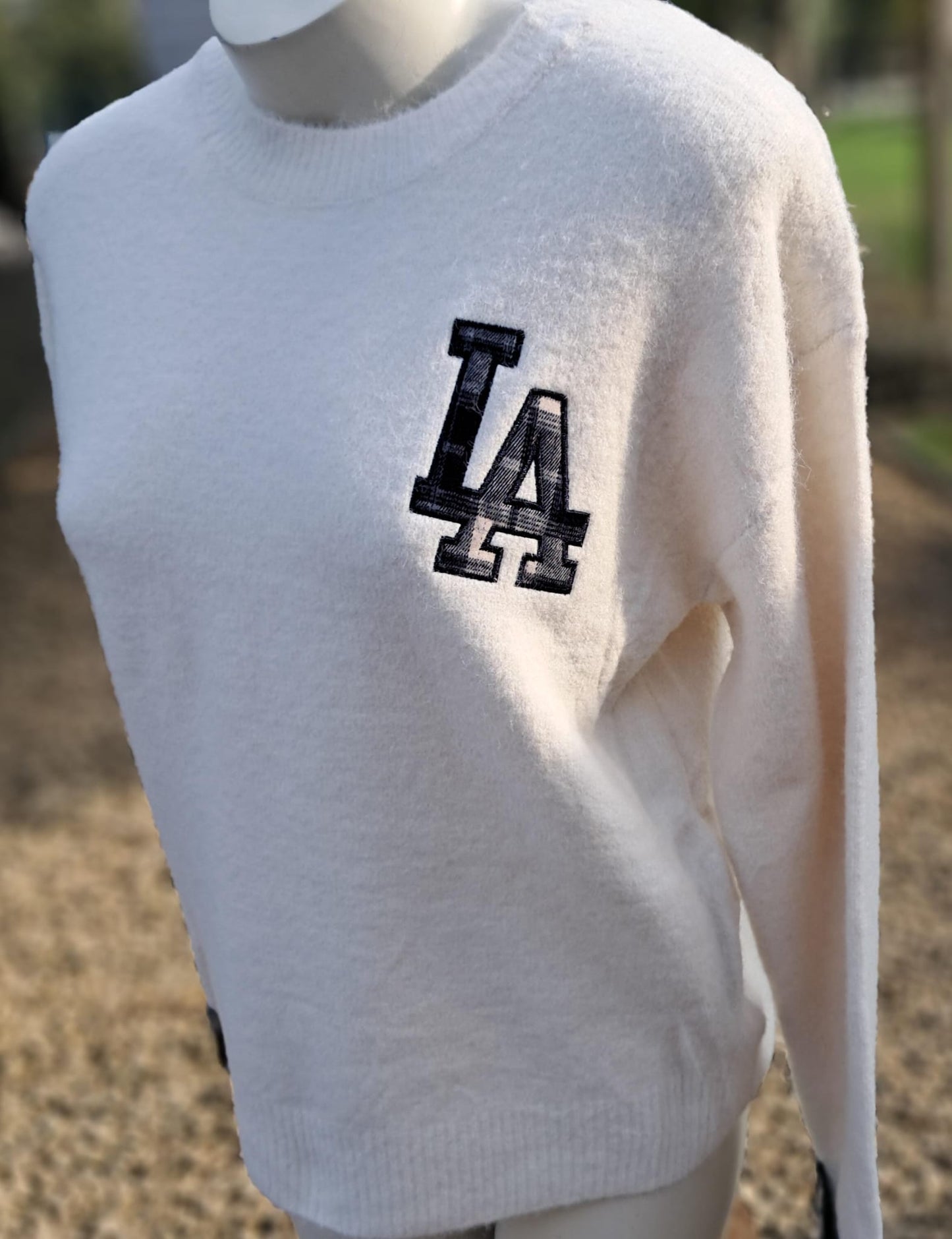 Zachte pull met ruit-accenten op de borst en aan de mouw, in 2 kleuren, TU