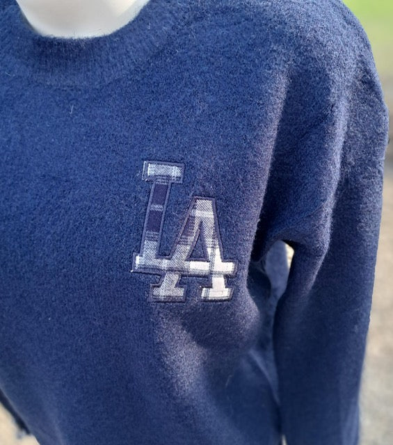 Zachte pull met ruit-accenten op de borst en aan de mouw, in 2 kleuren, TU